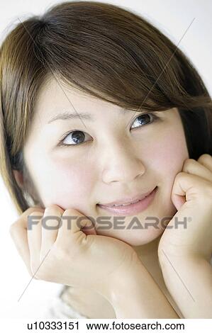 Woman who pricks cheek View Large Photo Image Stock Image - Woman who pricks cheek. Fotosearch