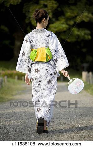 Stock Photo - Back figure of the yukata woman. Fotosearch