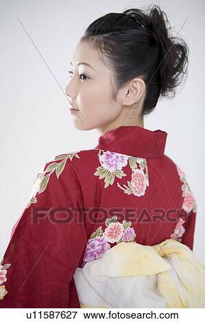 Stock Photo - Back figure of yukata woman. Fotosearch
