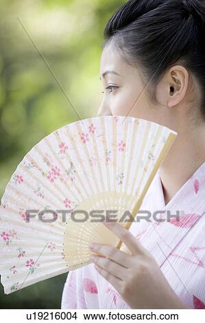 Japanese folding fan and yukata woman View Large Photo Image Picture - Japanese folding fan and yukata woman. Fotosearch
