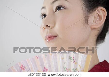 Japanese folding fan and yukata woman View Large Photo Image Stock Image - Japanese folding fan and yukata woman. Fotosearch