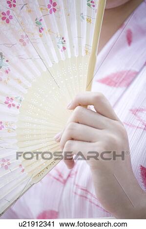 Stock Image - Japanese folding fan. Fotosearch