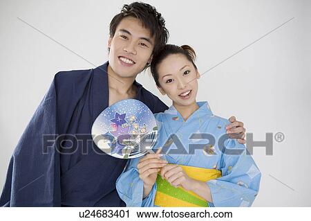 Stock Image - Sweetheart wearing yukata. Fotosearch