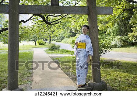 Stock Image - Verdure and yukata woman. Fotosearch