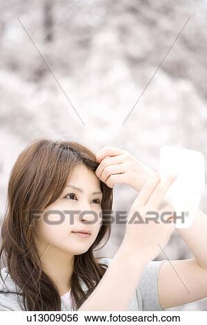 Cherry tree and woman View Large Photo Image Stock Photograph - Cherry tree and woman. Fotosearch