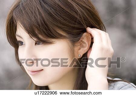 Stock Photograph - Cherry tree and woman. Fotosearch