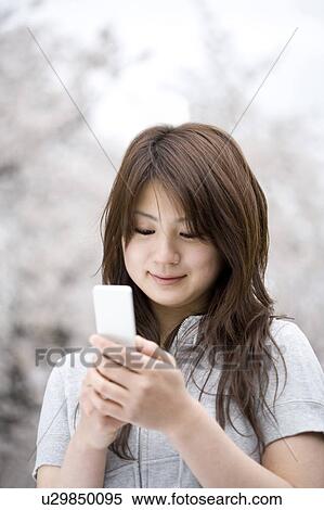 Cherry tree and woman View Large Photo Image Stock Photography - Cherry tree and woman. Fotosearch