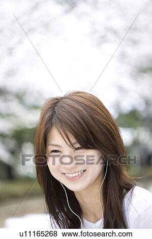 Woman under the cherry tree View Large Photo Image Stock Photo - Woman under the cherry tree. Fotosearch