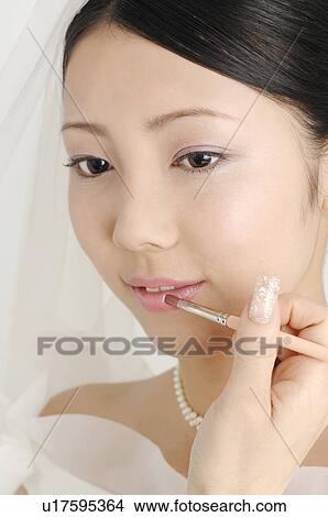 Bride who does makeup View Large Photo Image Picture - Bride who does makeup. Fotosearch