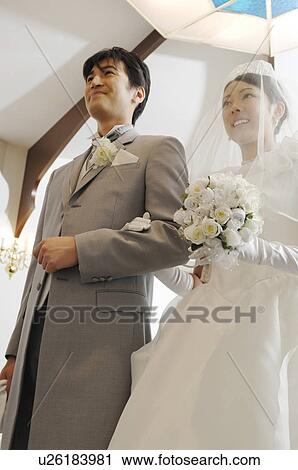 Stock Image - Bridegroom and bride. Fotosearch