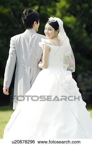Bridegroom and bride View Large Photo Image Stock Photograph - Bridegroom and bride. Fotosearch