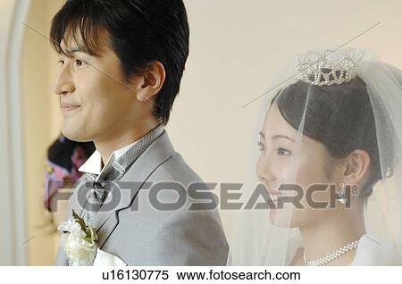 Stock Photography - Bridegroom and bride. Fotosearch