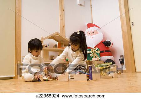 Brother and sister playing together View Large Photo Image Picture - Brother and sister playing together. Fotosearch