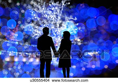 Couple standing holding hands View Large Photo Image Picture - Couple standing holding hands. Fotosearch