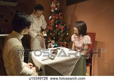 Stock Photograph - Sommelier recommending wine. Fotosearch