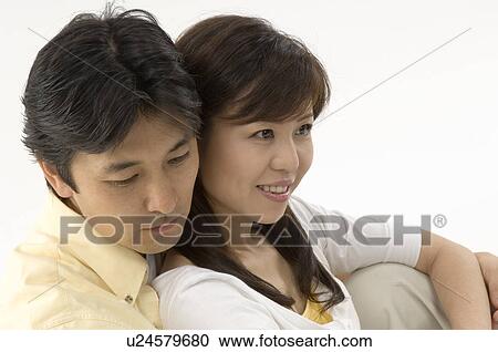 Husband and wife embracing View Large Photo Image Stock Image - Husband and wife embracing. Fotosearch