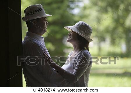 Picture - Mature couple embracing. Fotosearch
