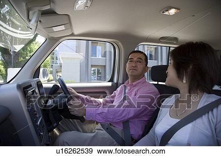 Mature couple in car View Large Photo Image Stock Photo - Mature couple in car. Fotosearch