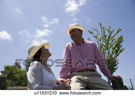 Stock Image - Mature couple smiling. Fotosearch