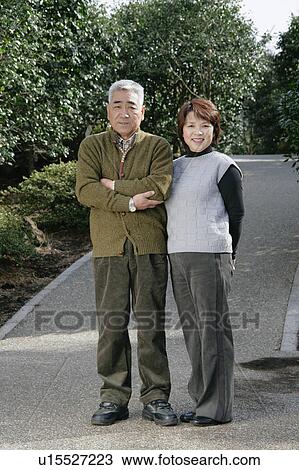 Stock Image - Portrait of senior couple smiling. Fotosearch