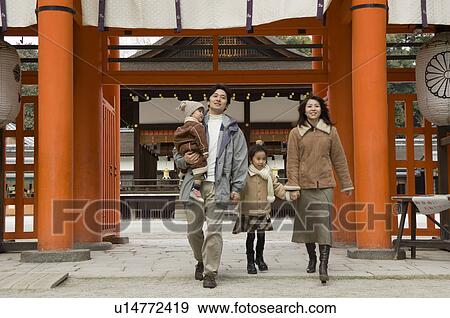 Family at shrine View Large Photo Image Stock Photo - Family at shrine. Fotosearch