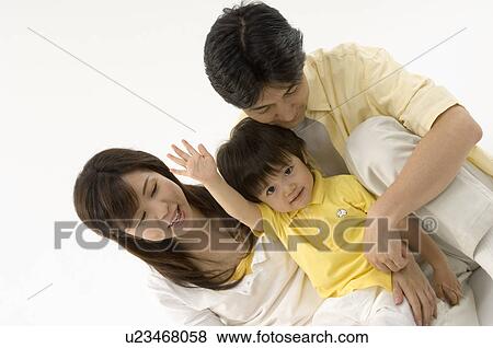 Family with one child View Large Photo Image Stock Photo - Family with one child. Fotosearch