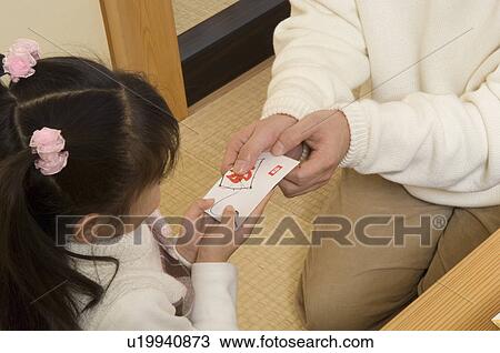 Father giving daughter some money View Large Photo Image Stock Image - Father giving daughter some money. Fotosearch