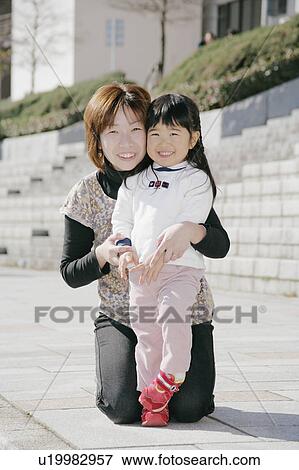 Portrait of mother and daughter View Large Photo Image Stock Photo - Portrait of mother and daughter. Fotosearch