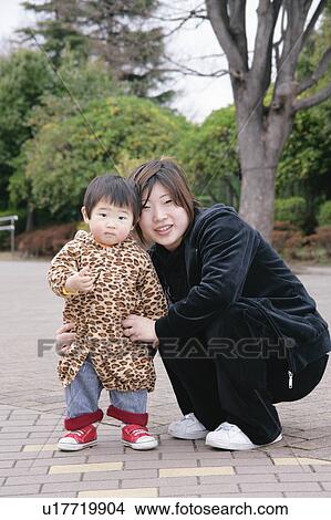Portrait of mother and son View Large Photo Image Picture - Portrait of mother and son. Fotosearch