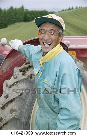 A farmer smiling View Large Photo Image Stock Photo - A farmer smiling. Fotosearch