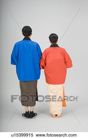 Man and woman wearing kimono, rear view View Large Photo Image Stock Photography - Man and woman wearing kimono, rear view. Fotosearch