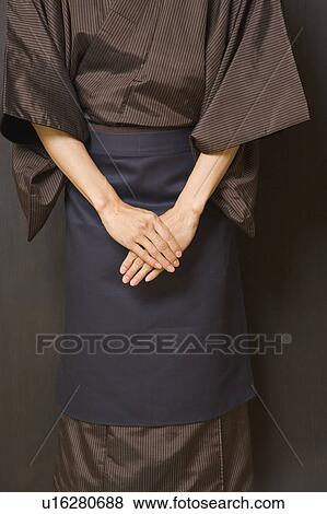 Man wearing kimono with apron View Large Photo Image Stock Photo - Man wearing kimono with apron. Fotosearch