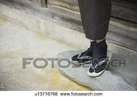 Man wearing zori sandal View Large Photo Image Stock Photo - Man wearing zori sandal. Fotosearch