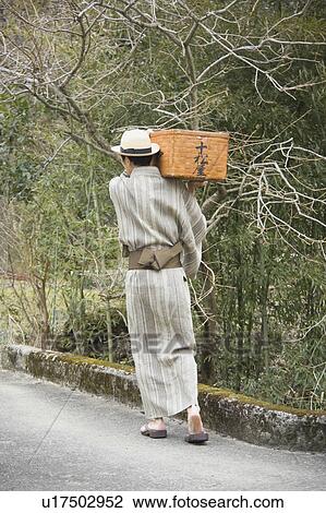 Stock Image - Old-fashioned peddler. Fotosearch