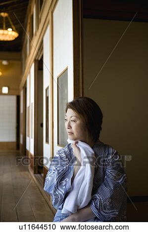 Senior woman wearing yukata View Large Photo Image Stock Image - Senior woman wearing yukata. Fotosearch