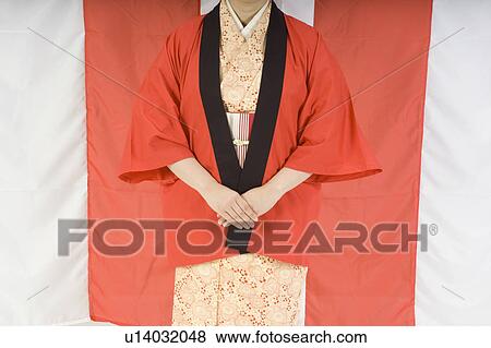 Stock Photo - Woman wearing kimono. Fotosearch