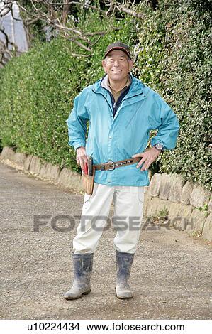 Picture - Portrait of a senior man standing. Fotosearch