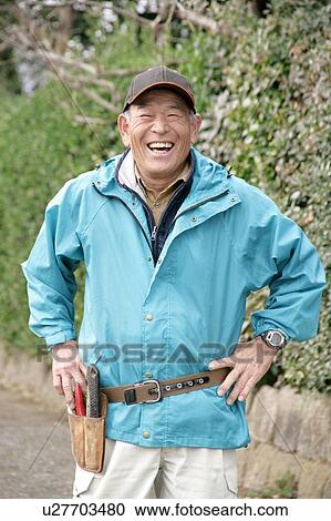 Portrait of a senior man standing View Large Photo Image Stock Image - Portrait of a senior man standing. Fotosearch