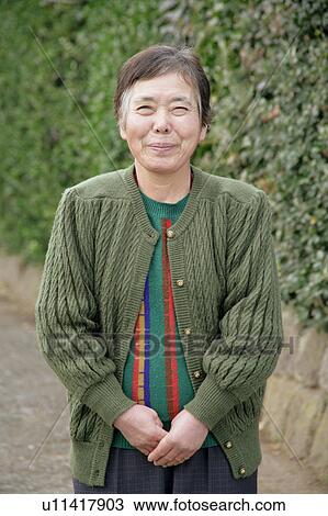 Stock Image - Portrait of a senior woman smiling. Fotosearch
