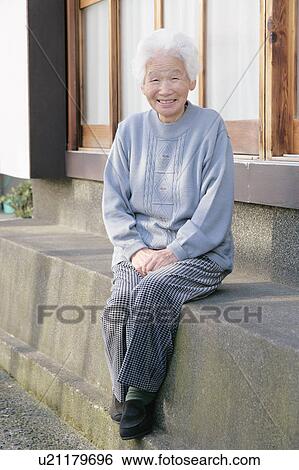 Stock Photograph - Portrait of a senior woman smiling. Fotosearch