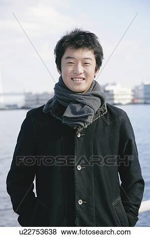Portrait of a young man View Large Photo Image Stock Photo - Portrait of a young man. Fotosearch