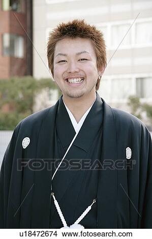 Portrait of a young man wearing kimono View Large Photo Image Picture - Portrait of a young man wearing kimono. Fotosearch