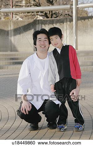 Portrait of father and son View Large Photo Image Stock Image - Portrait of father and son. Fotosearch