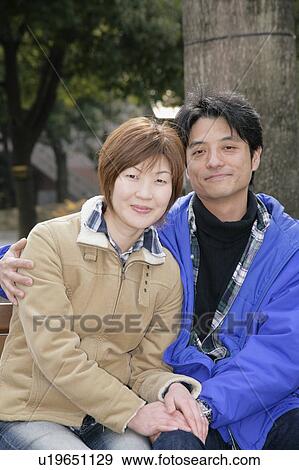 Stock Photo - Portrait of mid adult couple. Fotosearch