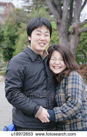 Stock Image - Portrait of young couple. Fotosearch