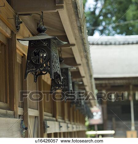 Lanterns hanging at shrine View Large Photo Image Stock Photo - Lanterns hanging at shrine. Fotosearch
