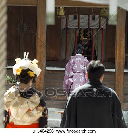 Stock Photograph - Traditional wedding ceremony at shrine. Fotosearch