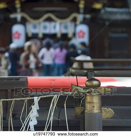 People praying at shrine View Large Photo Image Stock Image - People praying at shrine. Fotosearch