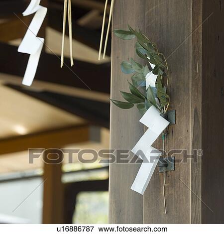 Stock Photo - Plant decorated on pillar at shrine. Fotosearch