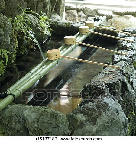 Stock Photo - Water basin at shrine. Fotosearch